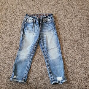 Womens gently used Rock Revival Capri jeans size 27 ripped spots when purchased